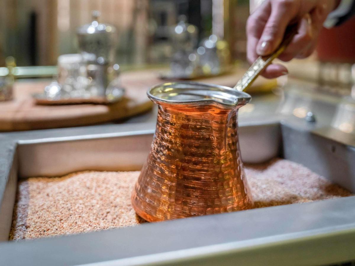 Mercure Trabzon Hotel Exterior foto Turkish coffee being prepared in a cezve
